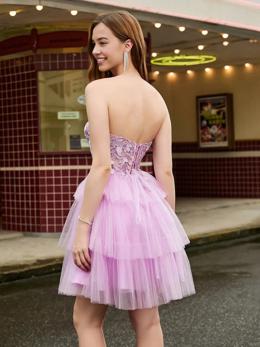Lilac short homecoming dress, back view showing the rear of the dress