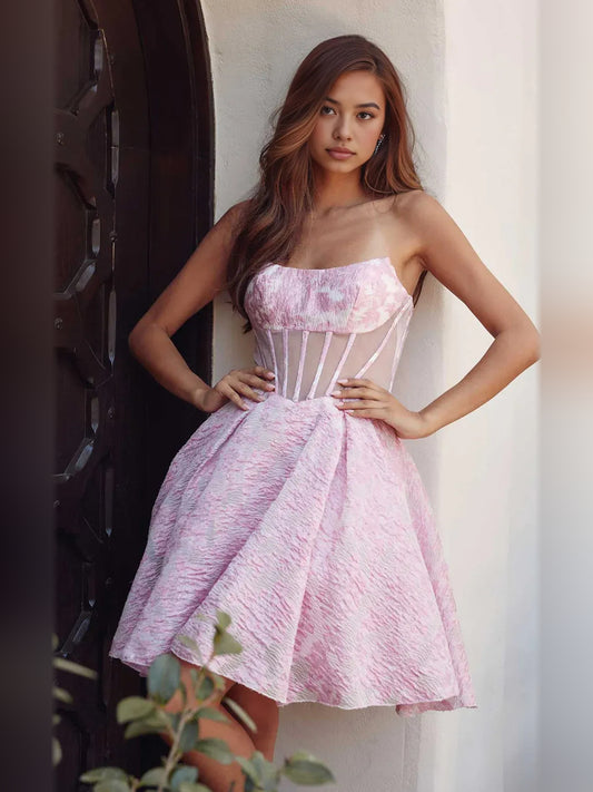 Pink short homecoming dress, back view showing the rear of the dress