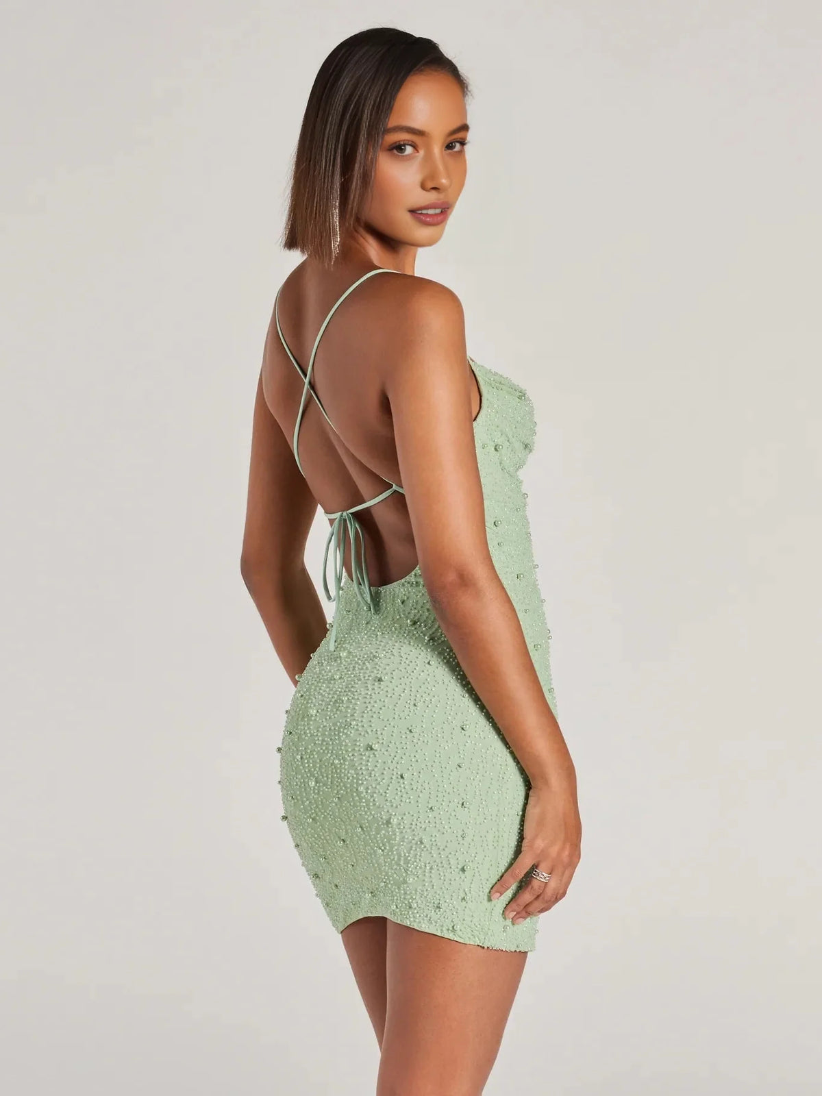 Mint Green mini homecoming dress, back view showing the rear of the dress