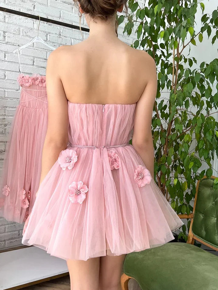 Light Pink mini homecoming dress, back view showing the rear of the dress