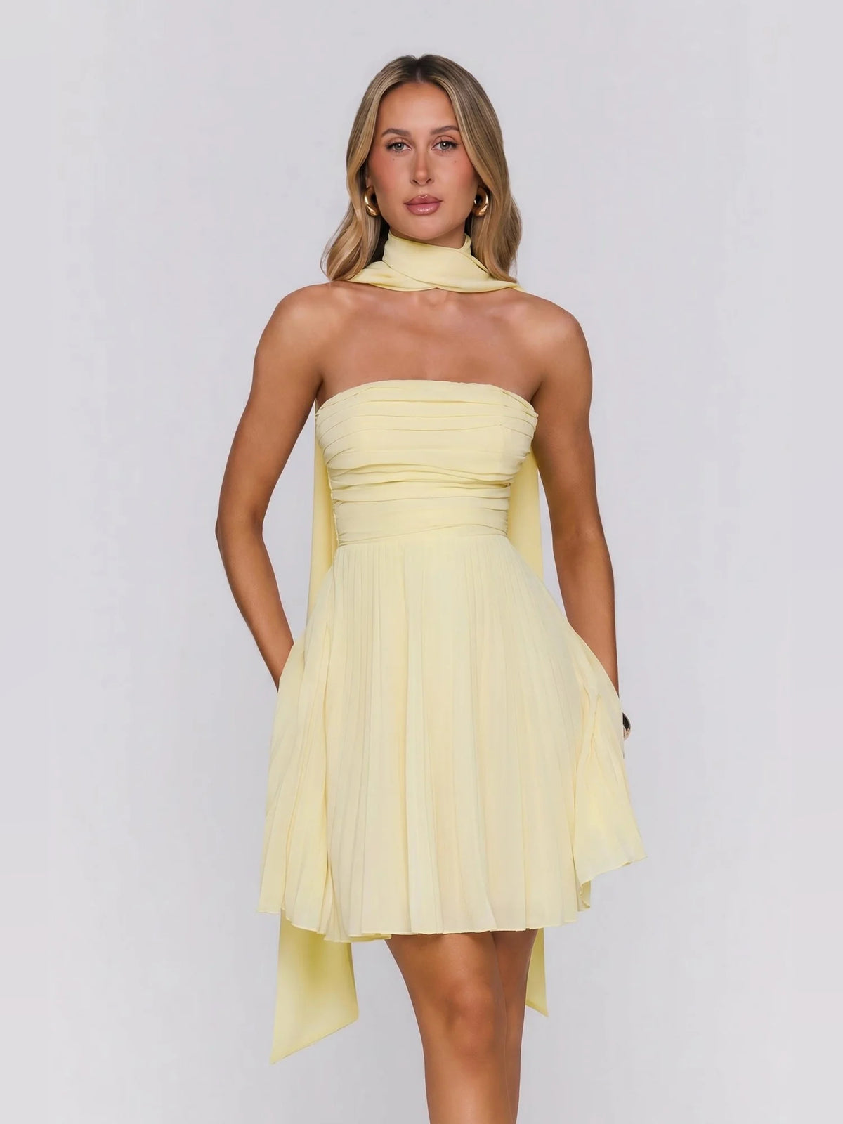 Yellow mini homecoming dress, alternate view showing the bodice and skirt