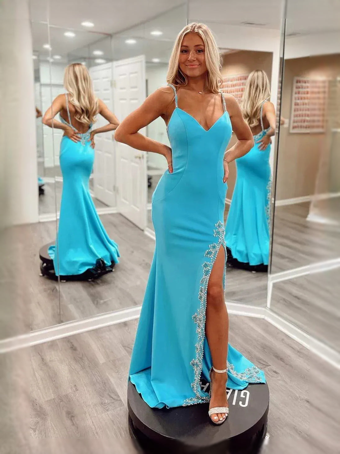 Turquoise maxi prom dress, back view showing the rear of the dress