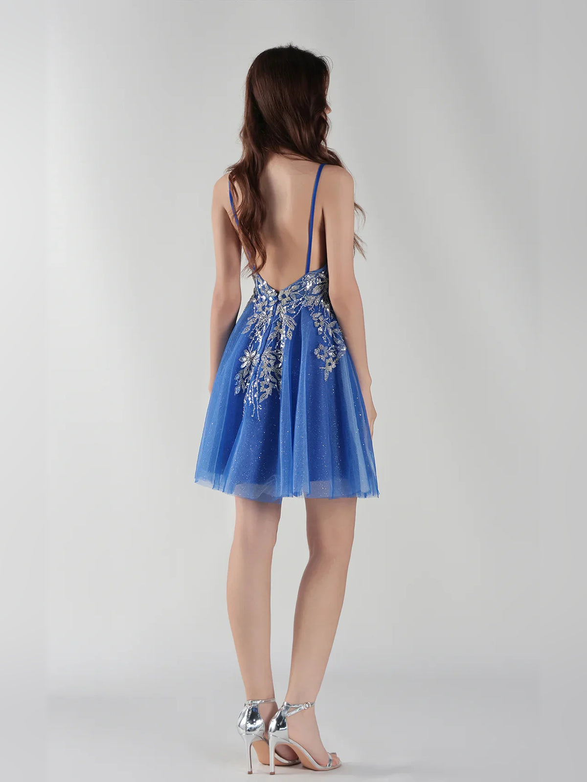 Blue mini homecoming dress, back view showing the rear of the dress