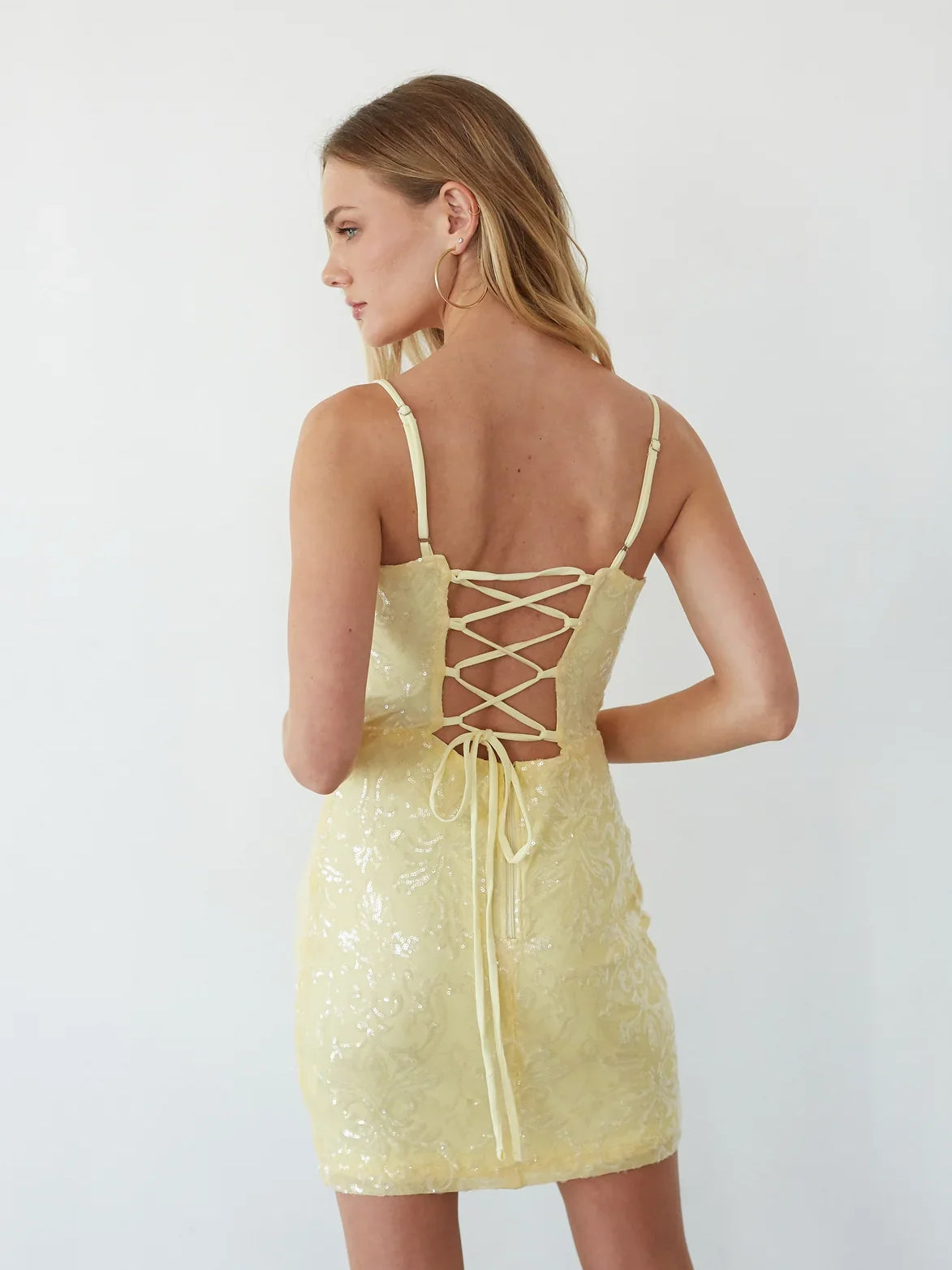 Daffodil mini homecoming dress, back view showing the rear of the dress