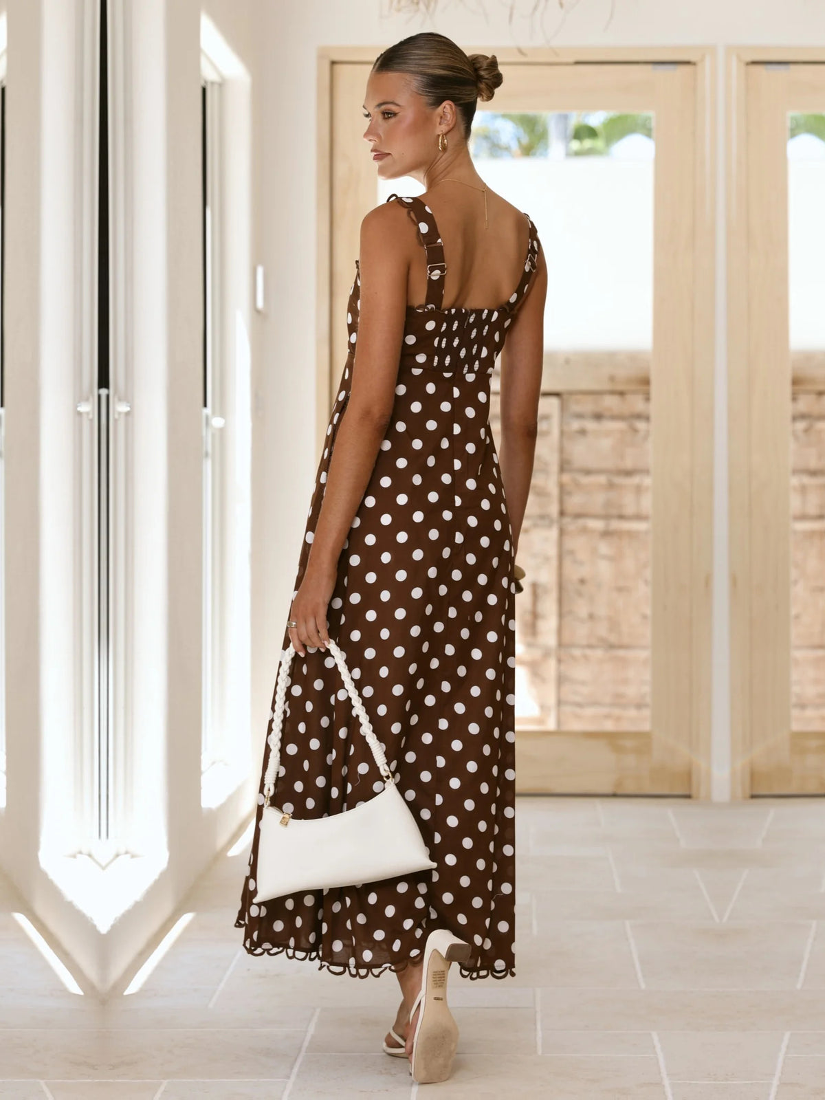 Brown a-line maxi formal dress with printed pattern, full-length back view