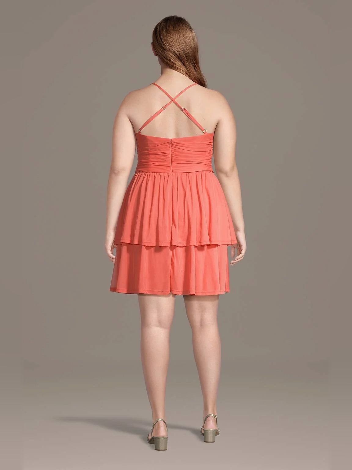 Coral mini homecoming dress, back view showing the rear of the dress
