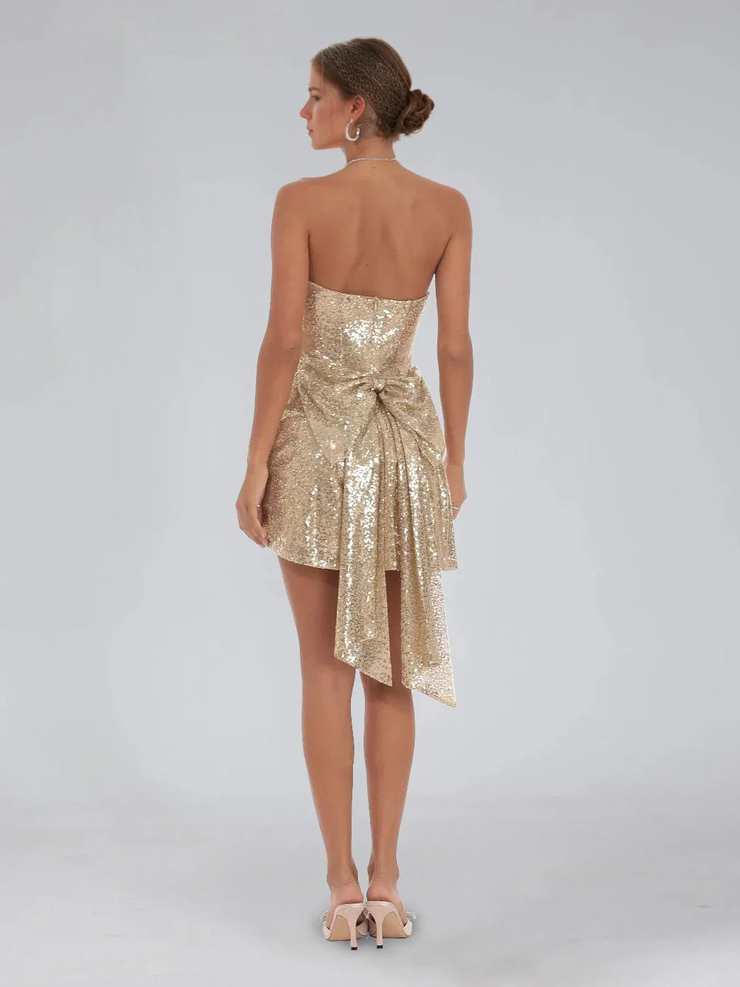 Champagne mini homecoming dress, back view showing the rear of the dress