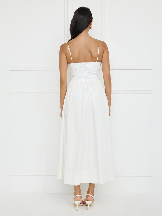White a-line maxi formal dress with floral appliqué, full-length back view