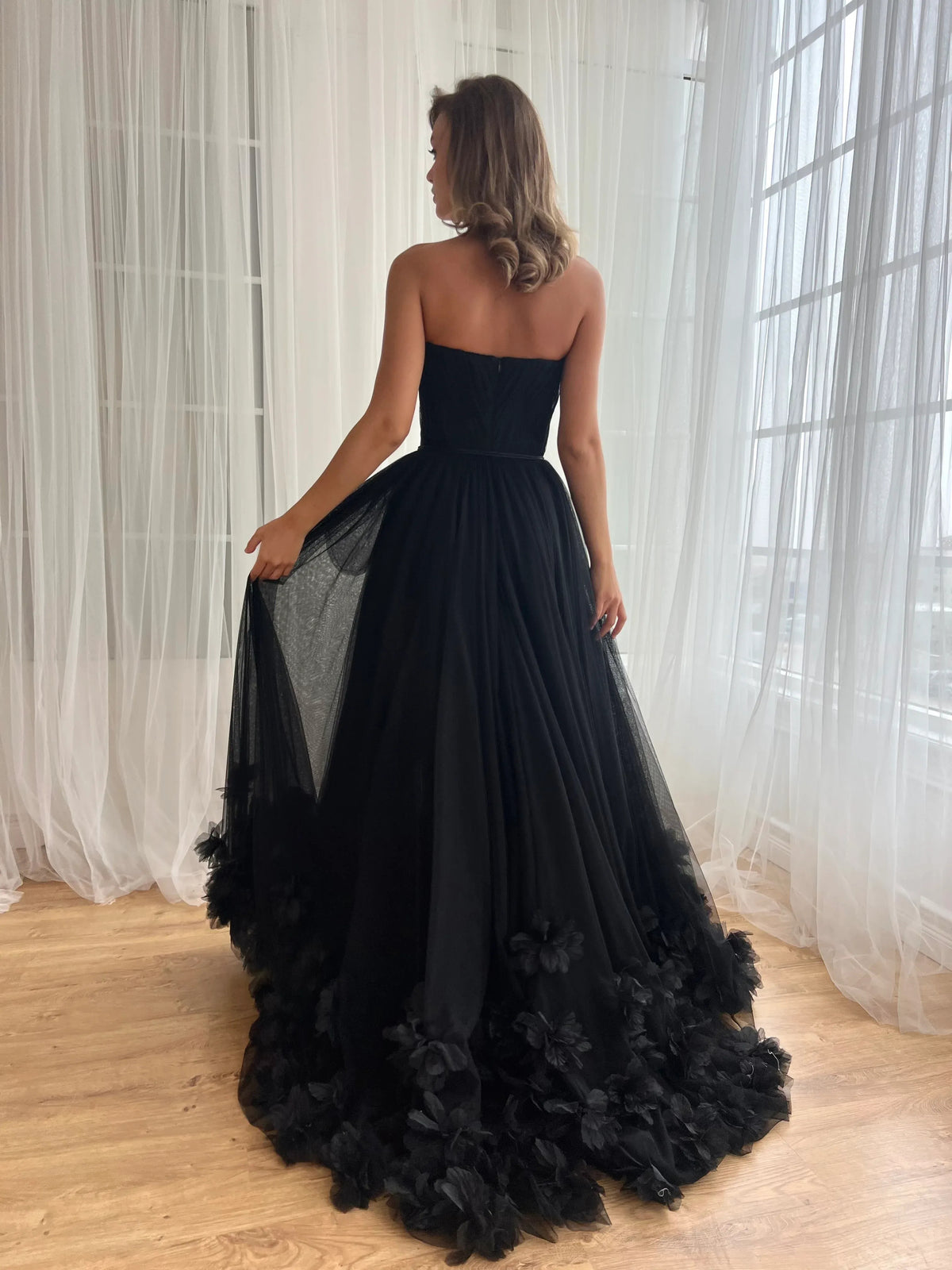 Black floor-length prom dress, alternate view showing the bodice and skirt