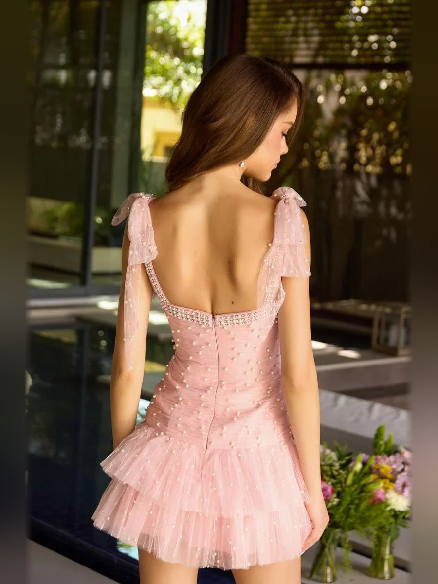 Blush Pink mini homecoming dress, back view showing the rear of the dress