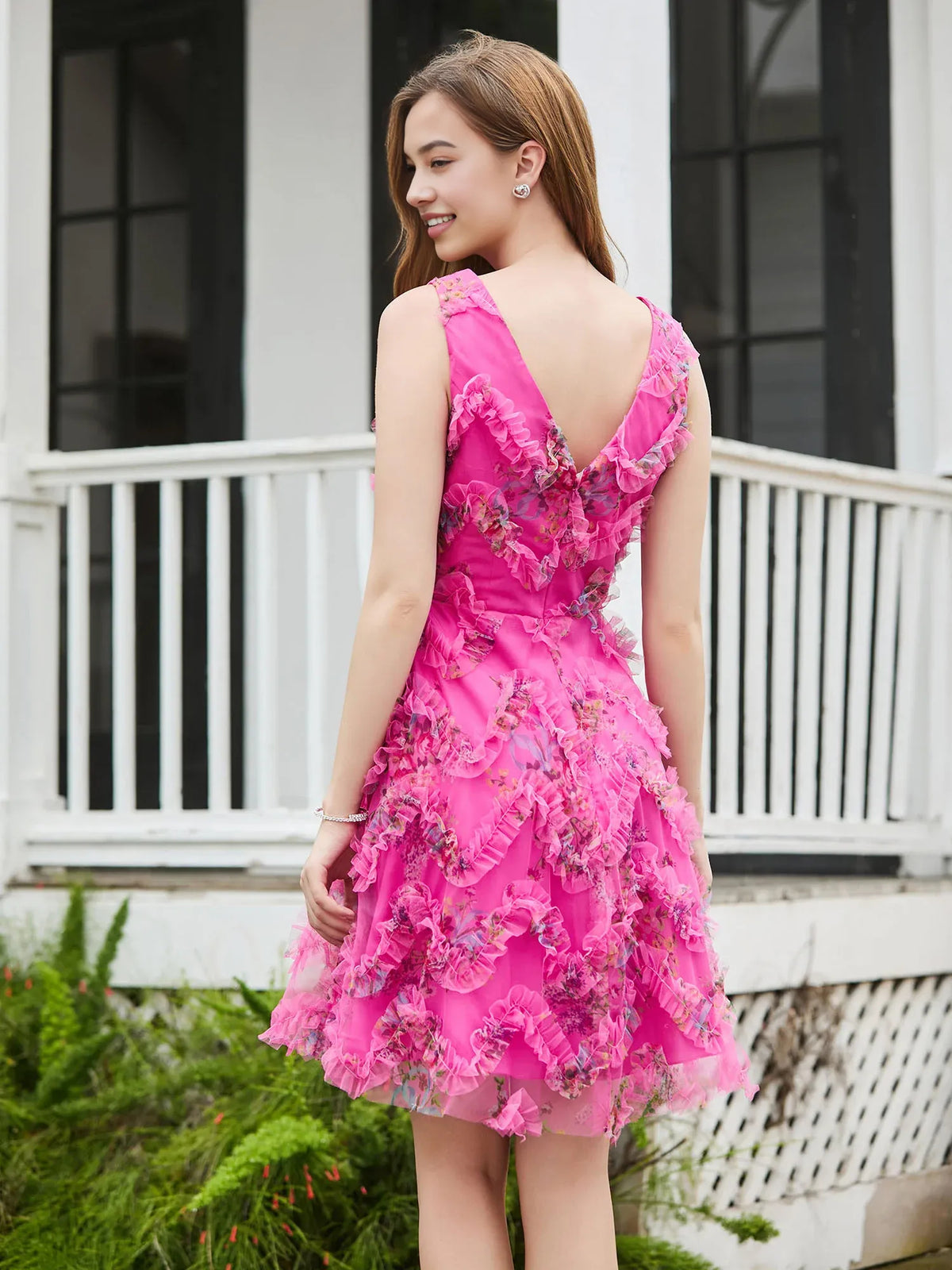 Hot Pink short homecoming dress, back view showing the rear of the dress