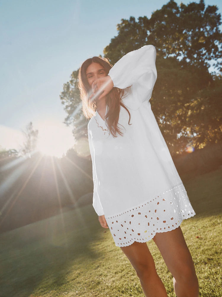 White mini homecoming dress, alternate view showing the bodice and skirt