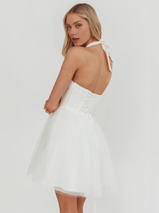 White mini homecoming dress, back view showing the rear of the dress