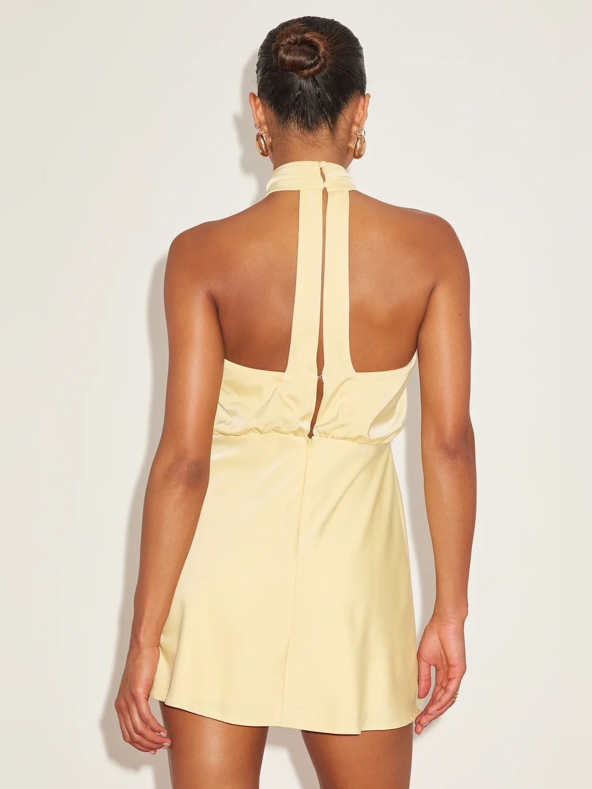 Canary mini homecoming dress, back view showing the rear of the dress