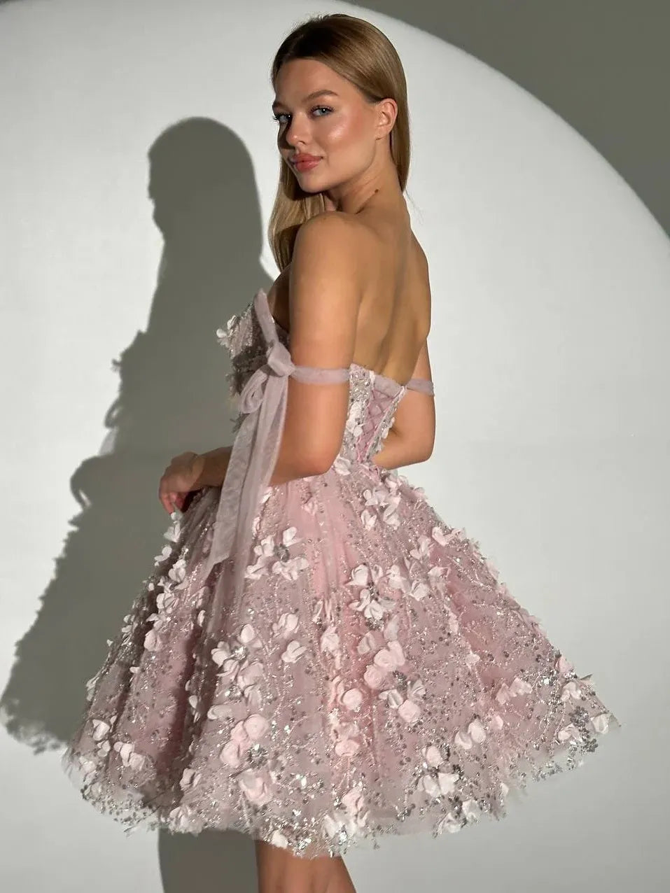Blush Pink mini homecoming dress, back view showing the rear of the dress