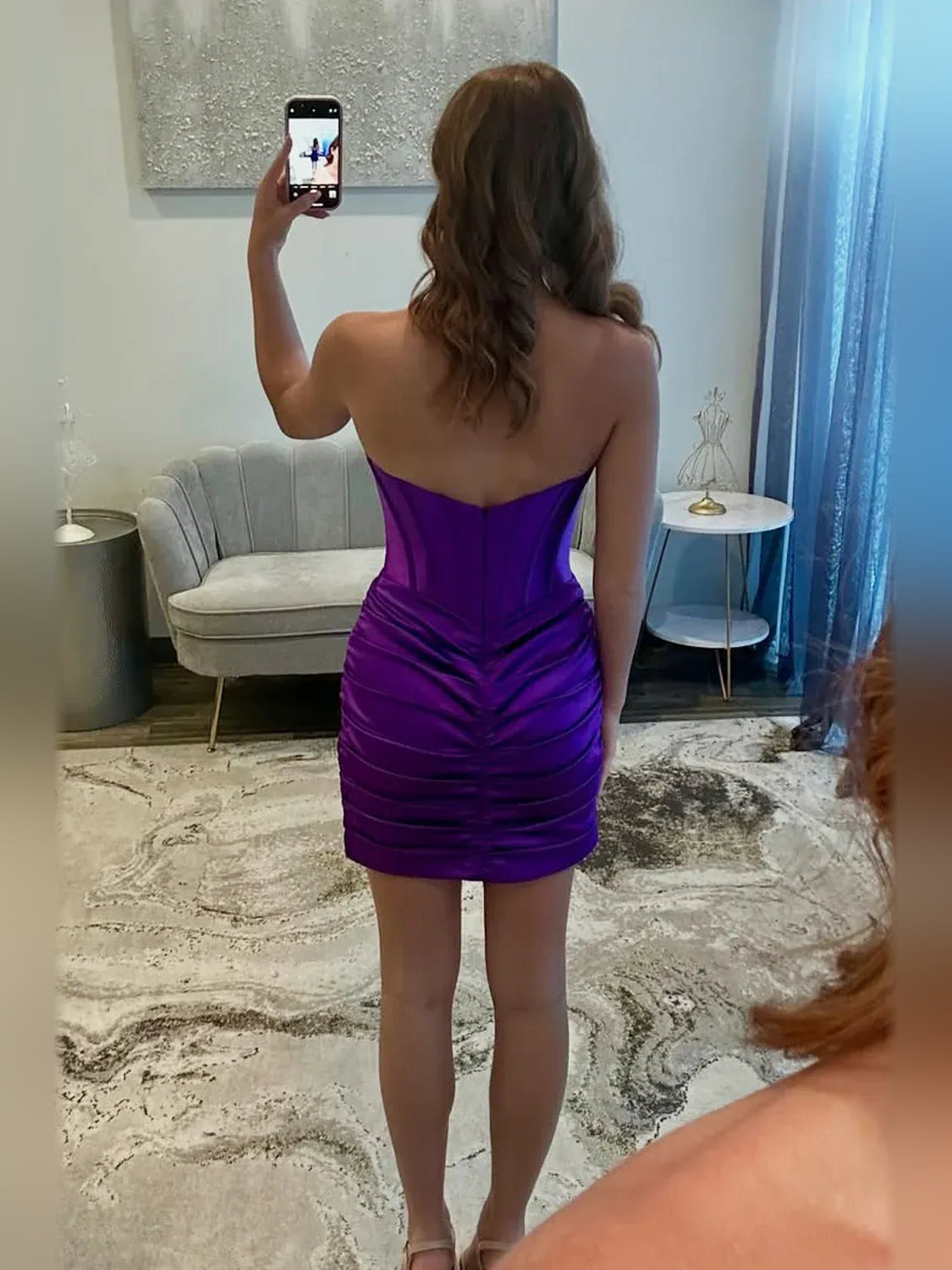Purple mini homecoming dress, back view showing the rear of the dress