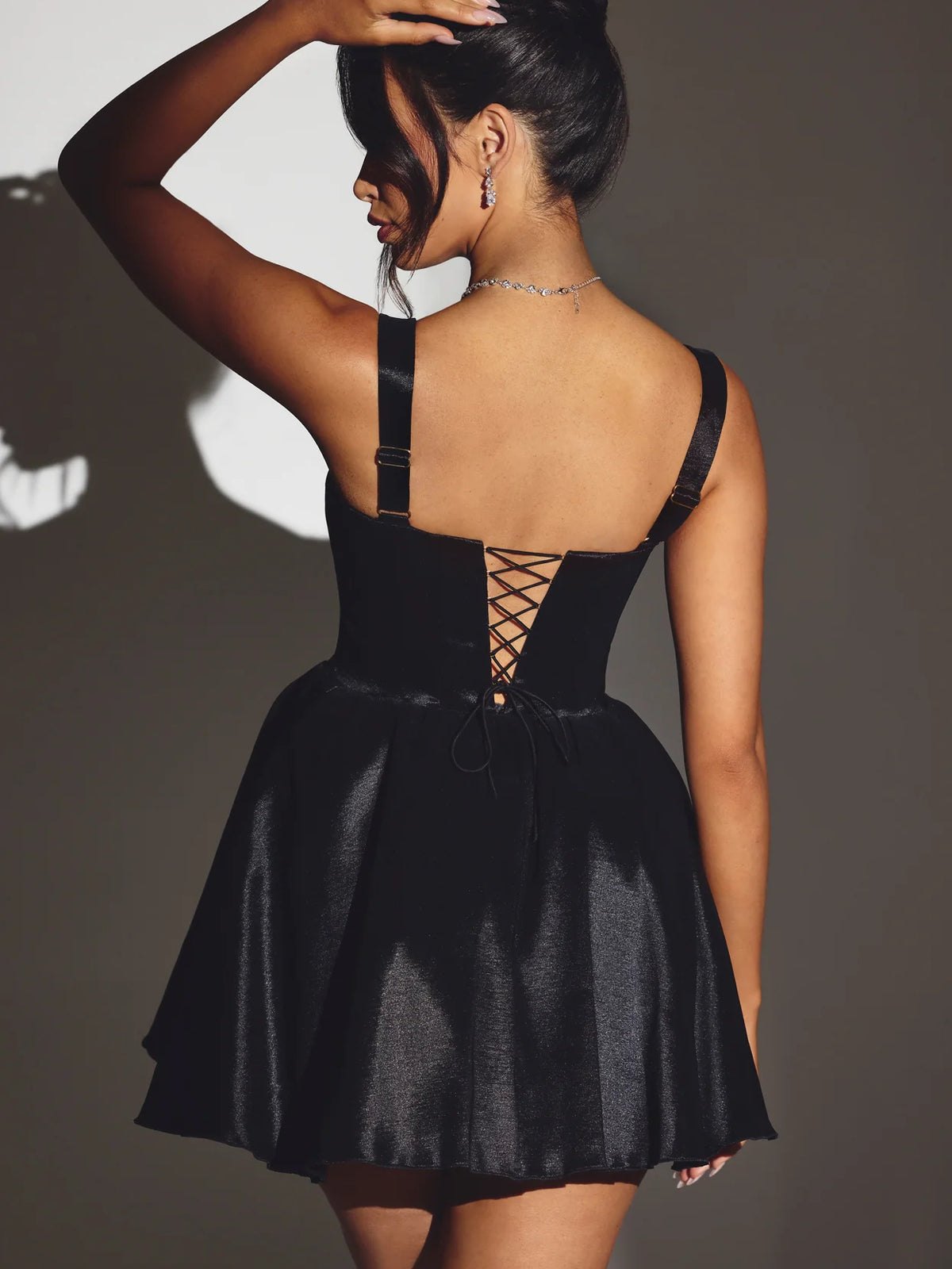Black mini homecoming dress, alternate view showing the bodice and skirt