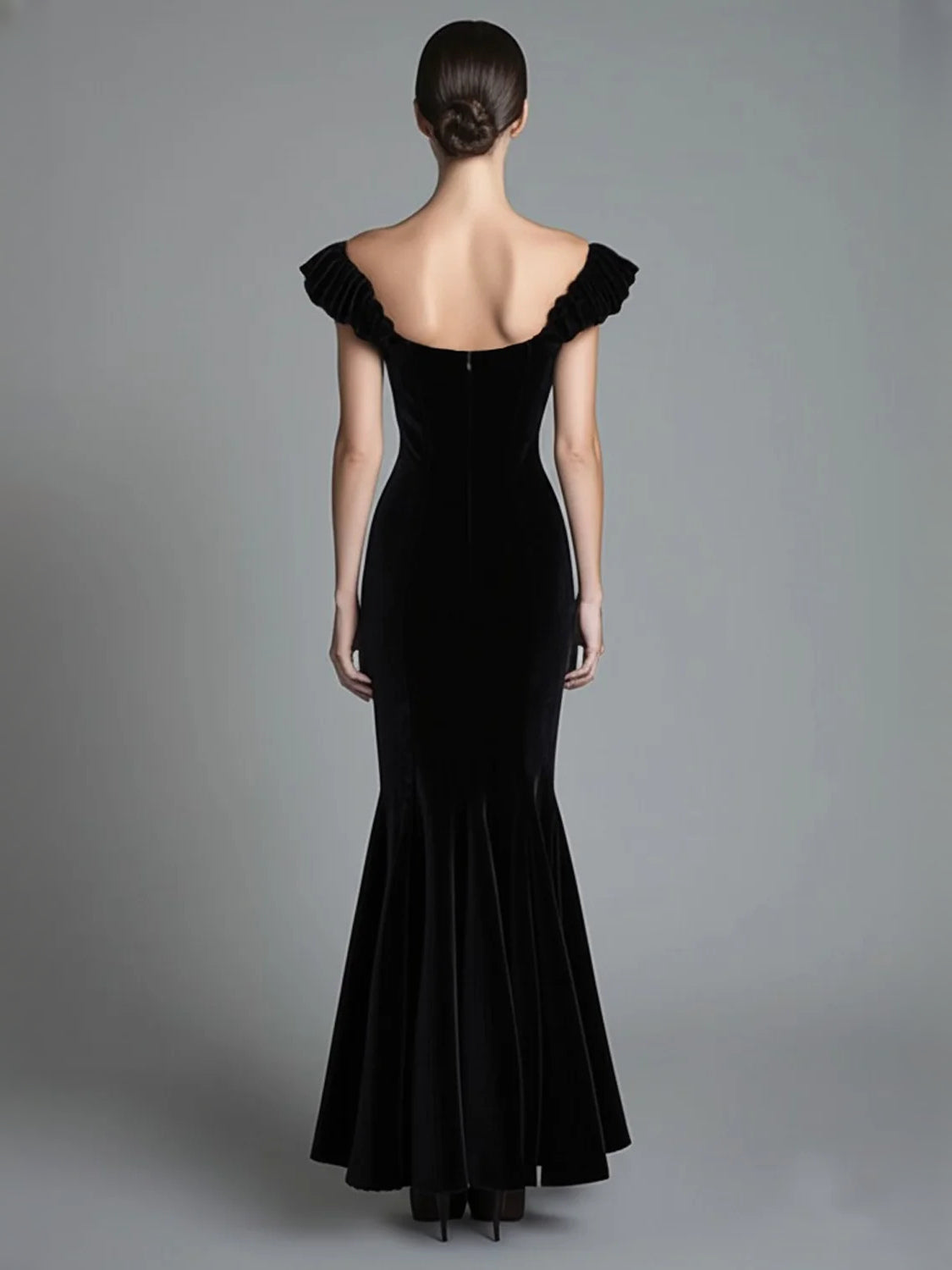 Black high-low prom dress, alternate view showing the bodice and skirt
