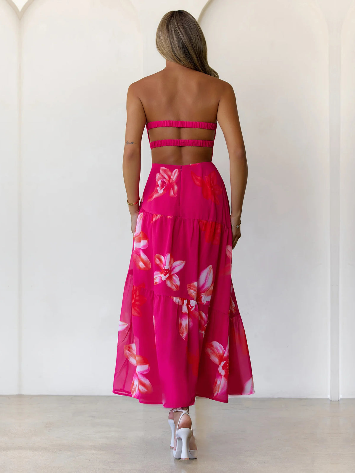 Pink a-line maxi formal dress with floral print, full-length back view
