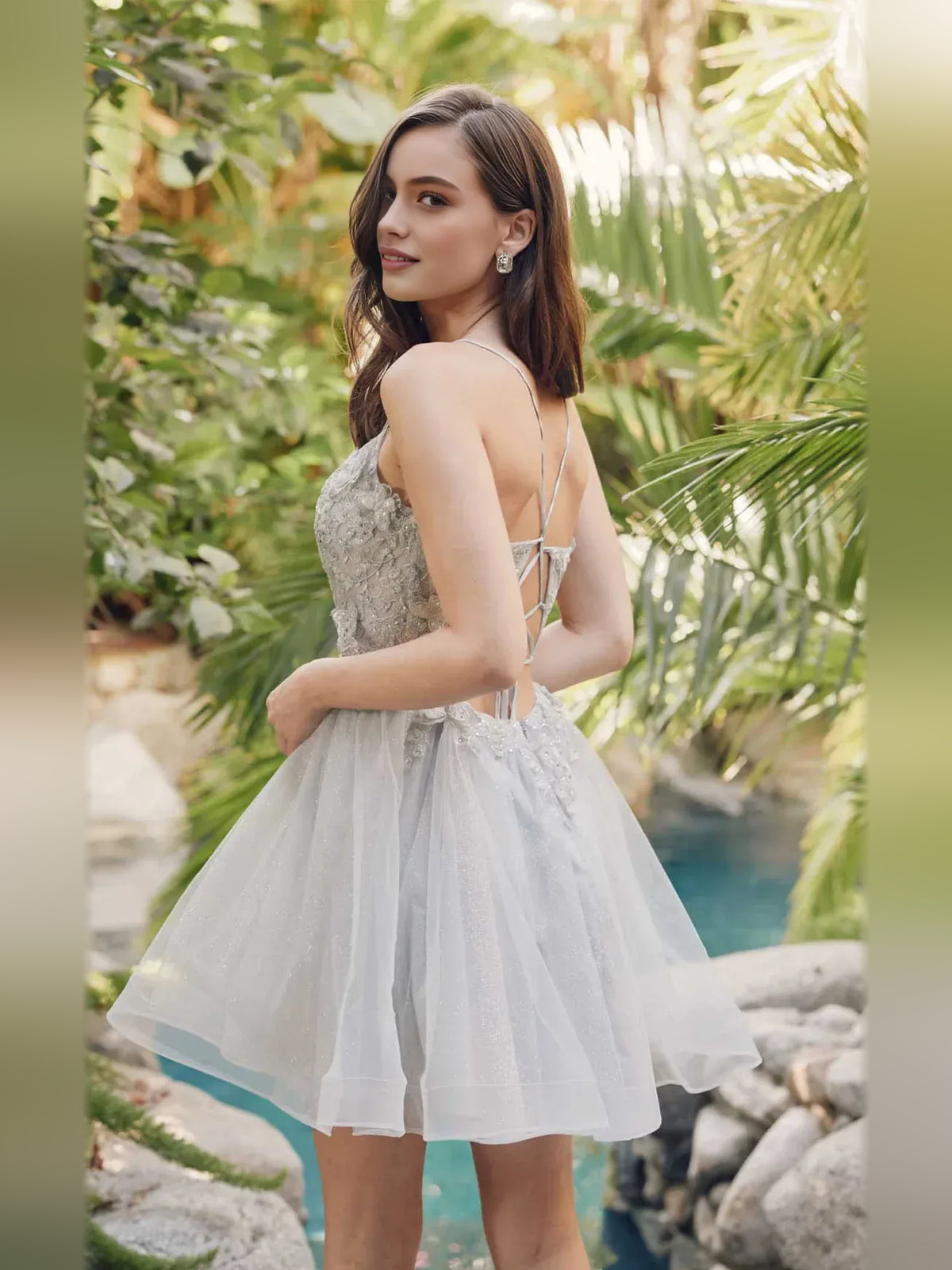 Silver mini homecoming dress, back view showing the rear of the dress