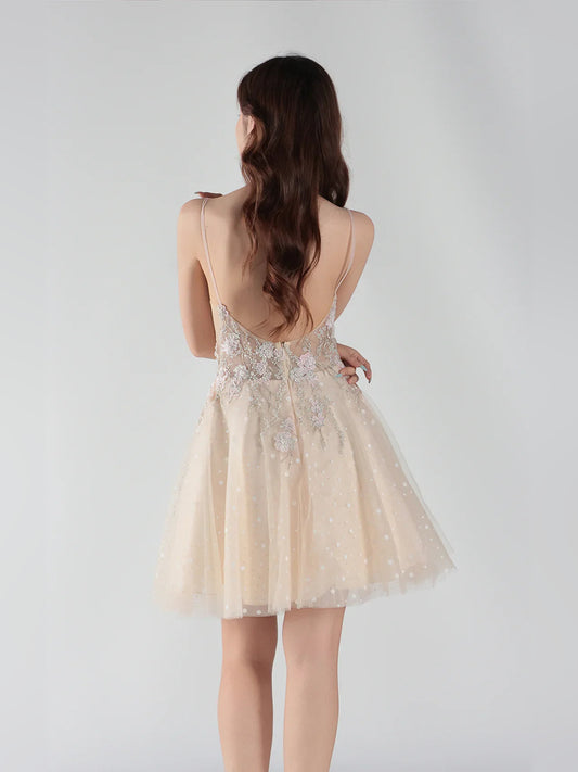 Champagne mini homecoming dress, back view showing the rear of the dress