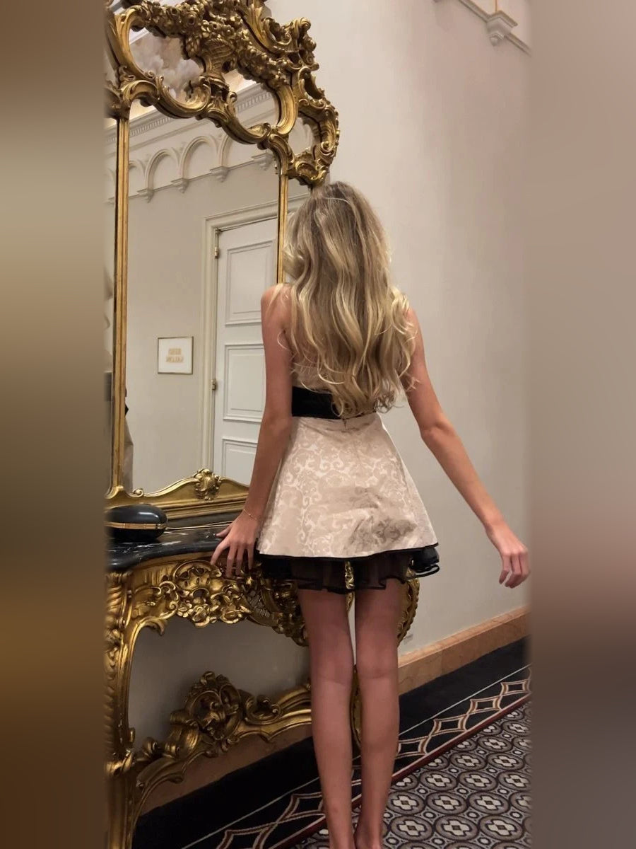 Ivory white mini homecoming dress, back view showing the rear of the dress