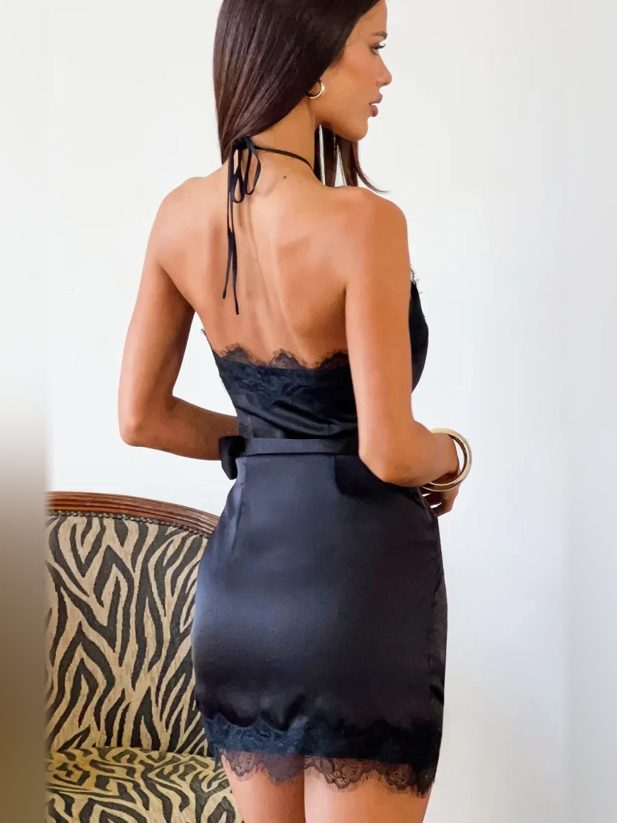 Black mini homecoming dress, back view showing the rear of the dress