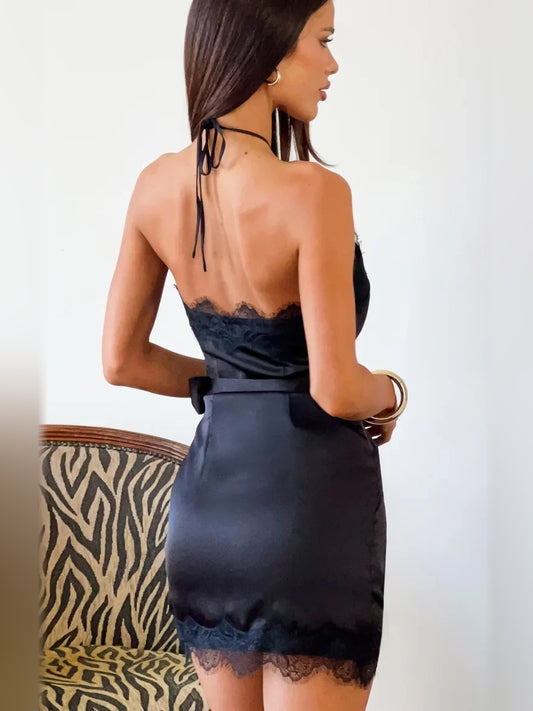 Black mini homecoming dress, back view showing the rear of the dress
