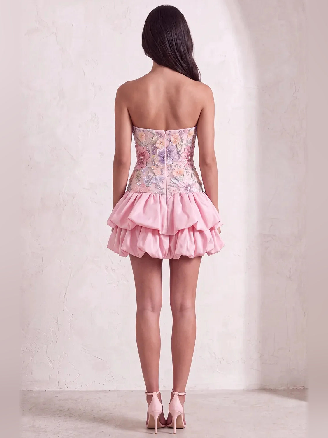 Pink mini homecoming dress, back view showing the rear of the dress