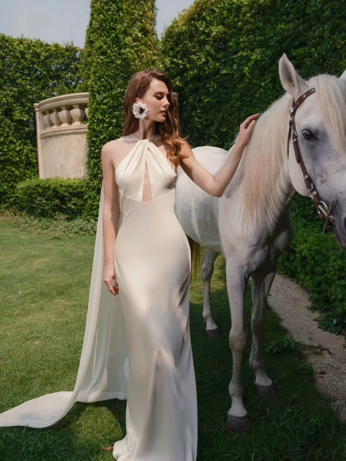 Ivory floor-length wedding dress, alternate view showing the dress shape and hem