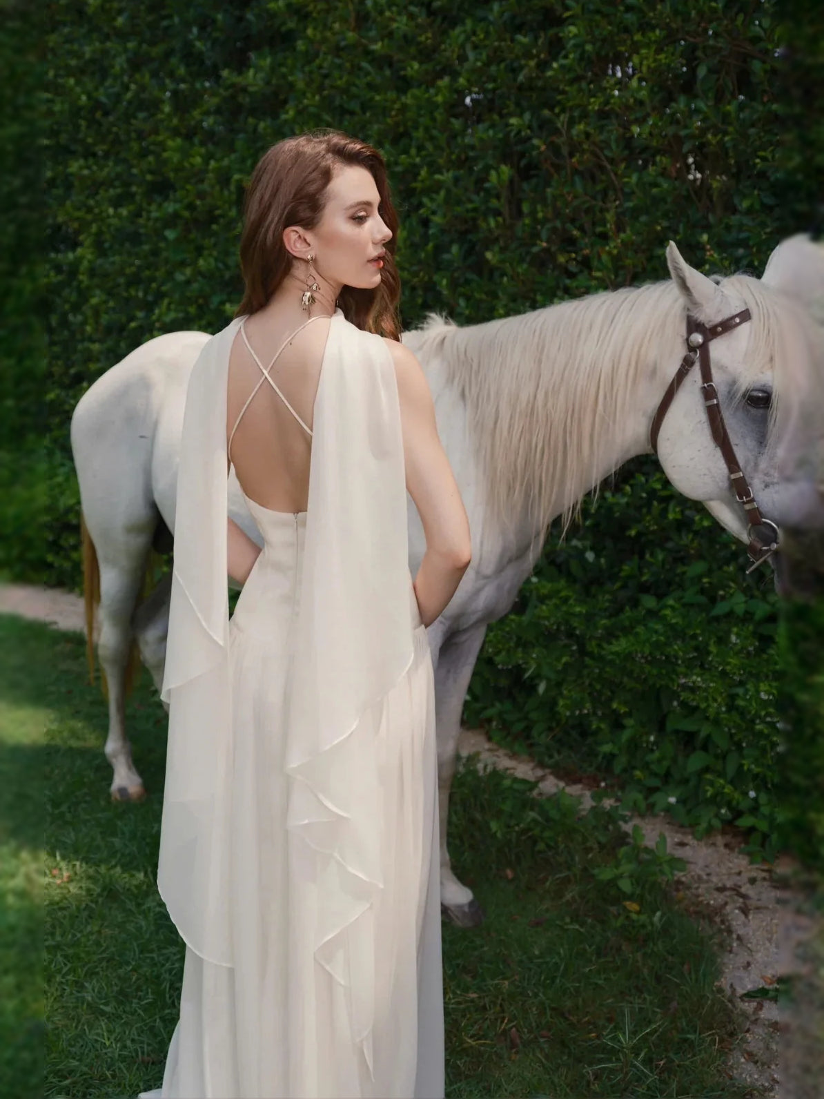 Ivory floor-length wedding dress, alternate view showing the dress shape and hem