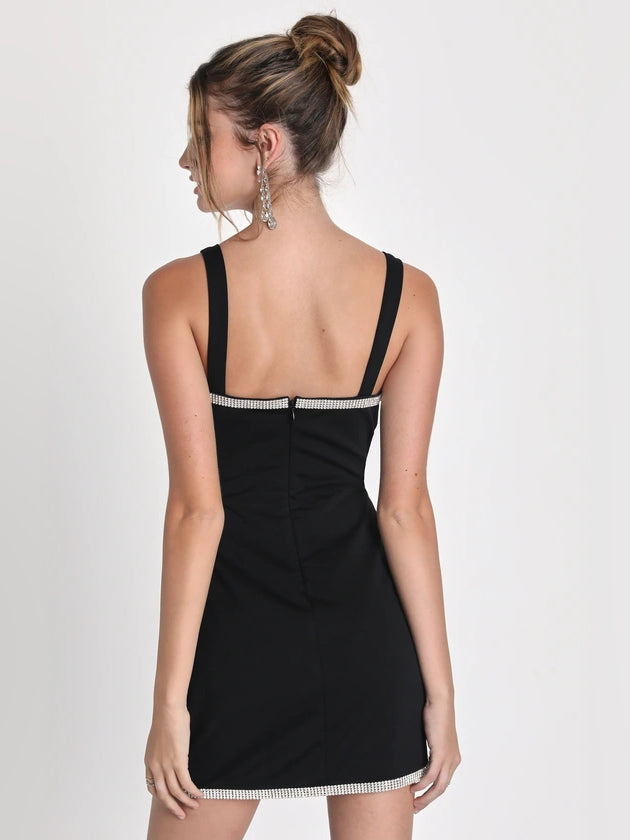 Black mini homecoming dress, alternate view showing the dress shape and hem