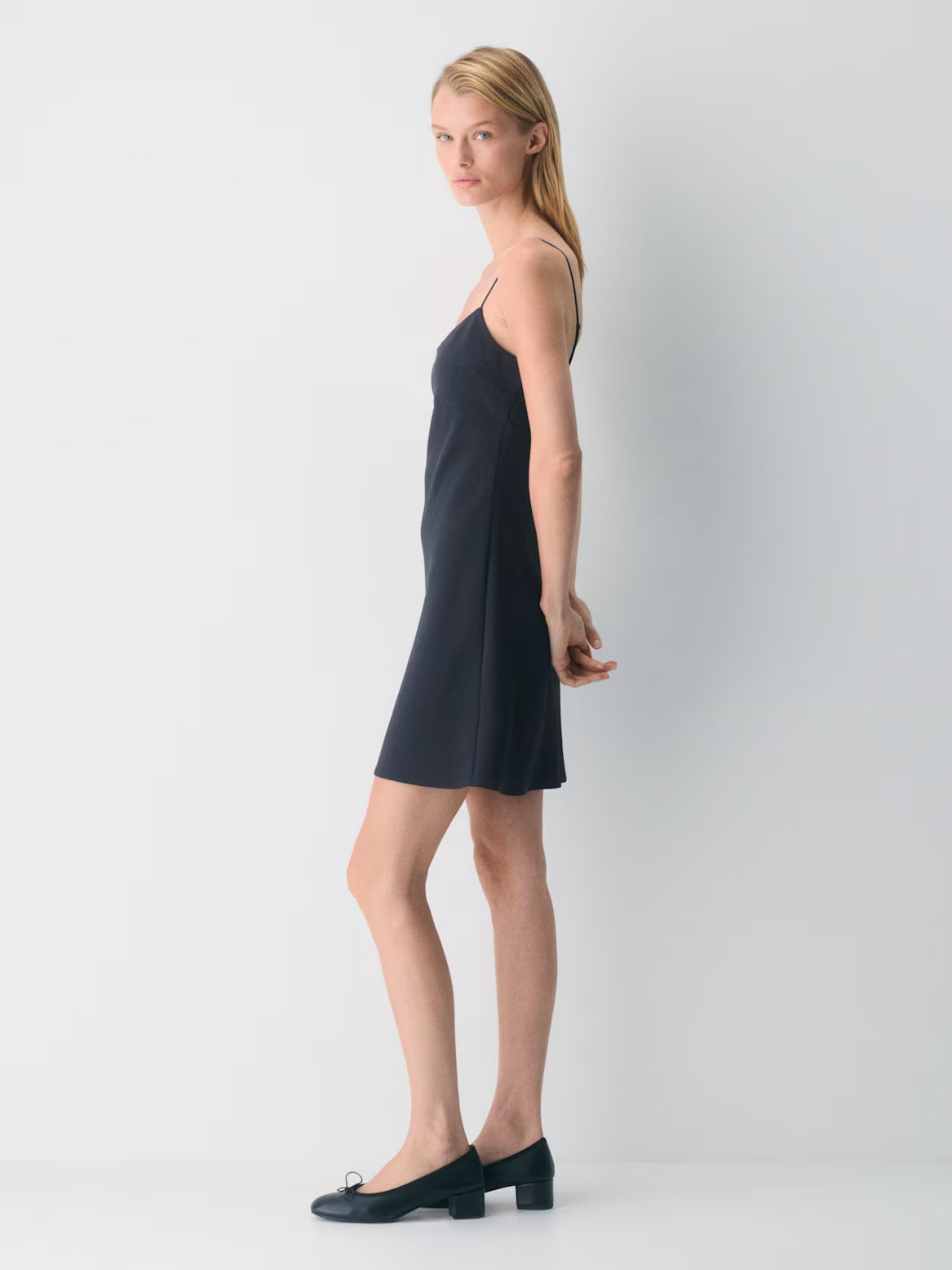 navy mini homecoming dress, alternate view showing the dress shape and hem