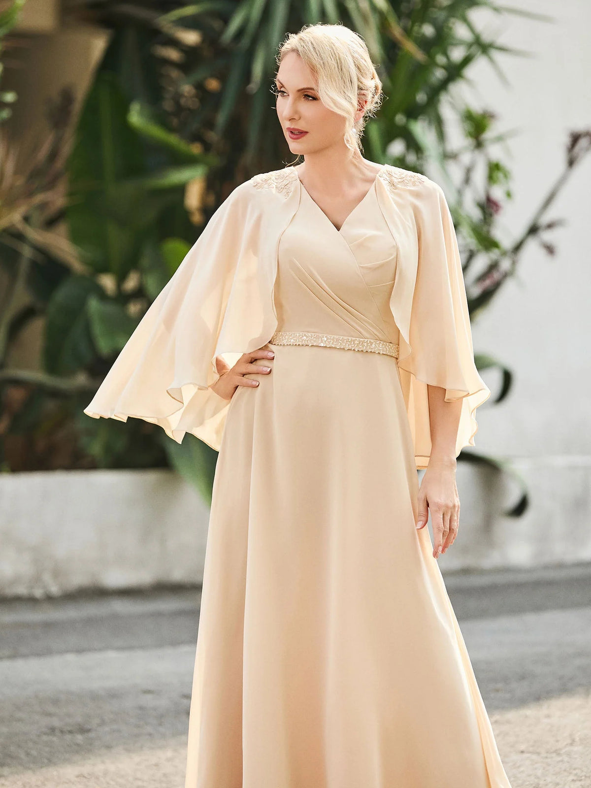 Champagne floor-length mother of the bride dress, alternate view showing the dress shape and hem