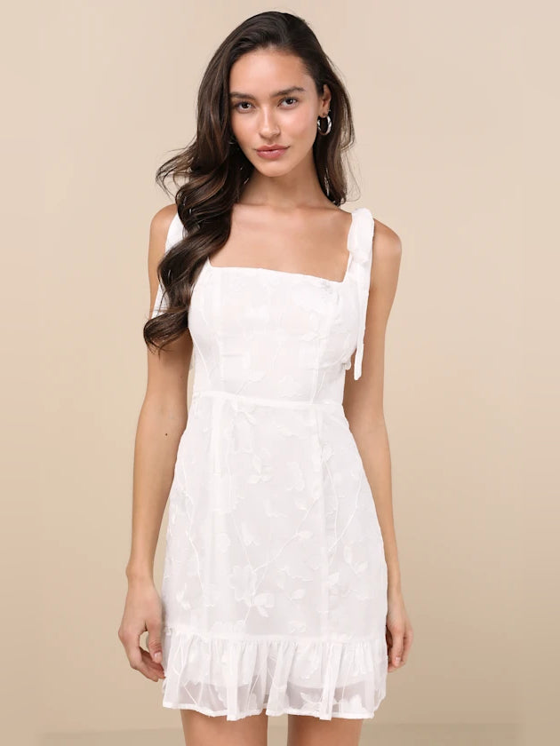 White Floral mini homecoming dress, alternate view showing the dress shape and hem