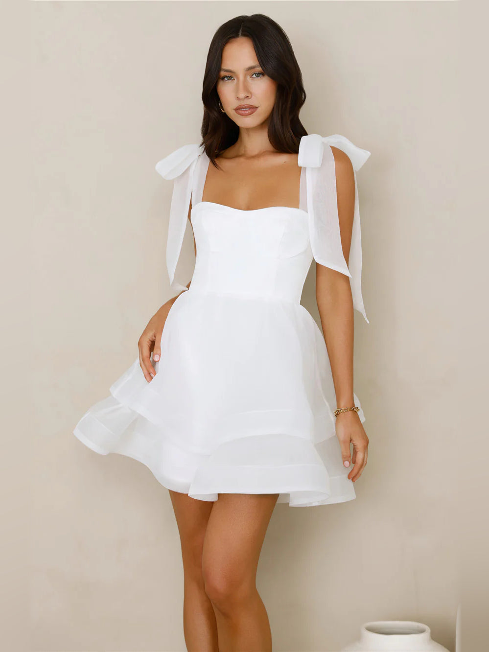 White mini homecoming dress, alternate view showing the dress shape and hem