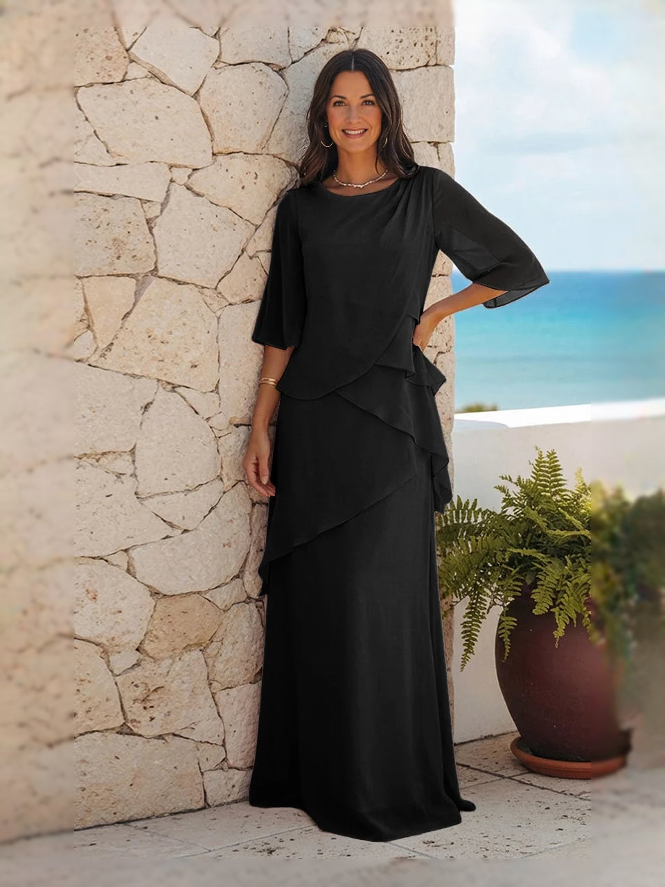 Black floor-length mother of the bride dress, alternate view showing the dress shape and hem