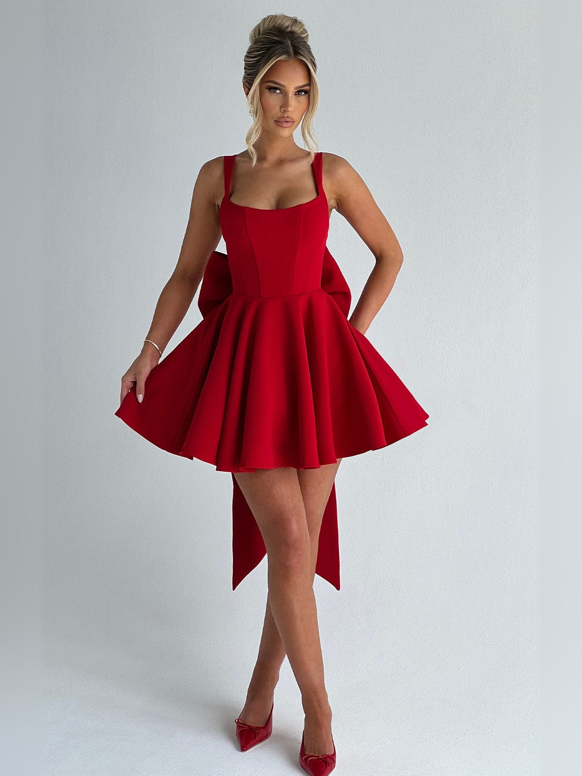 Red mini homecoming dress, alternate view showing the dress shape and hem