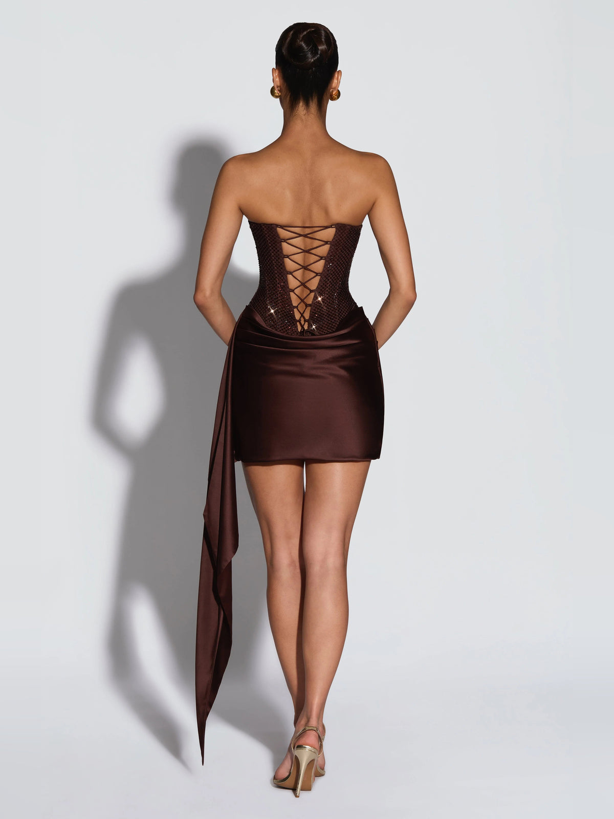 Brown mini homecoming dress, alternate view showing the dress shape and hem