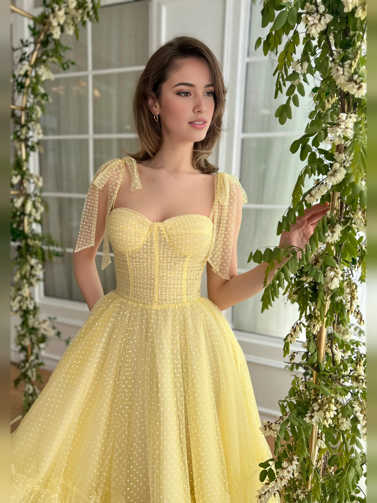 Yellow tea-length homecoming dress, alternate view showing the dress shape and hem