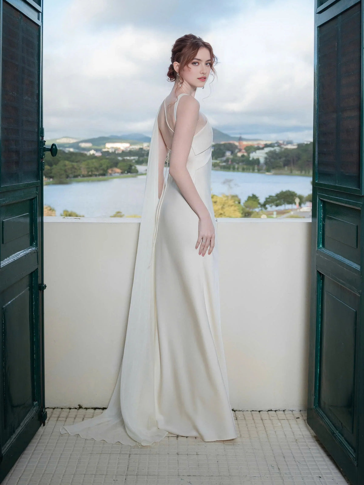 Ivory floor-length wedding dress, alternate view showing the dress shape and hem