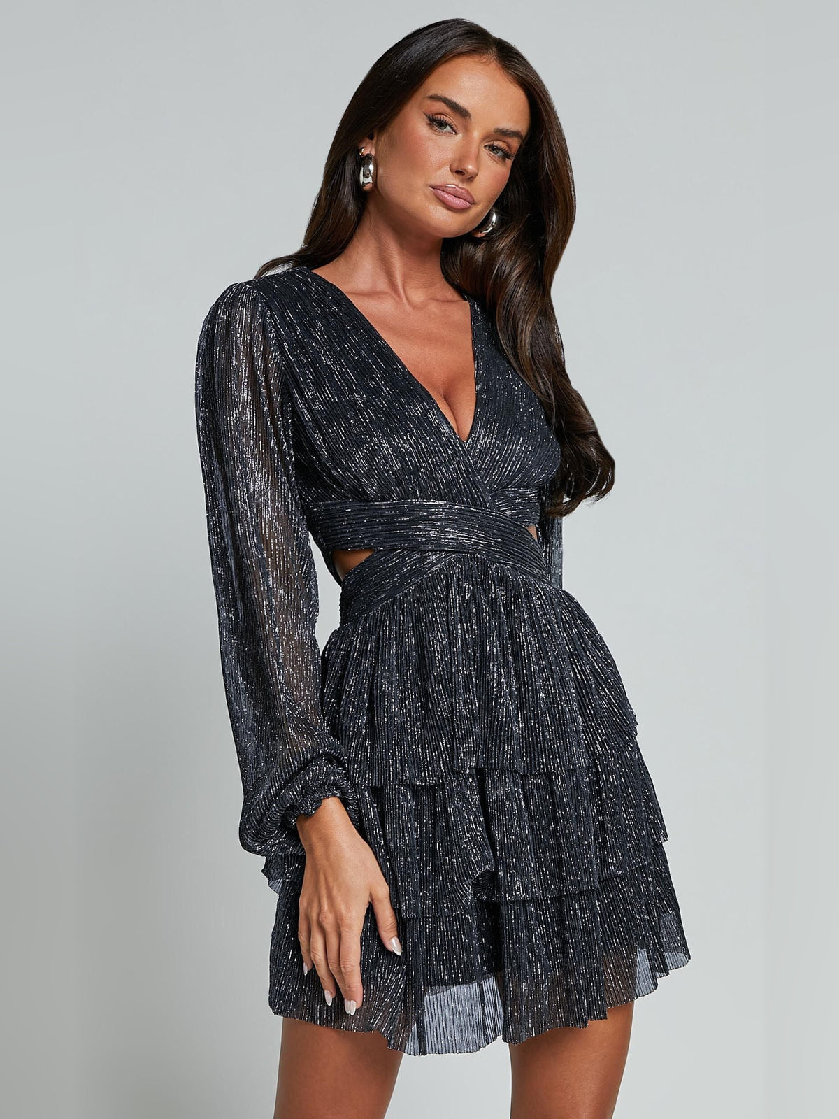 Black mini homecoming dress, alternate view showing the dress shape and hem