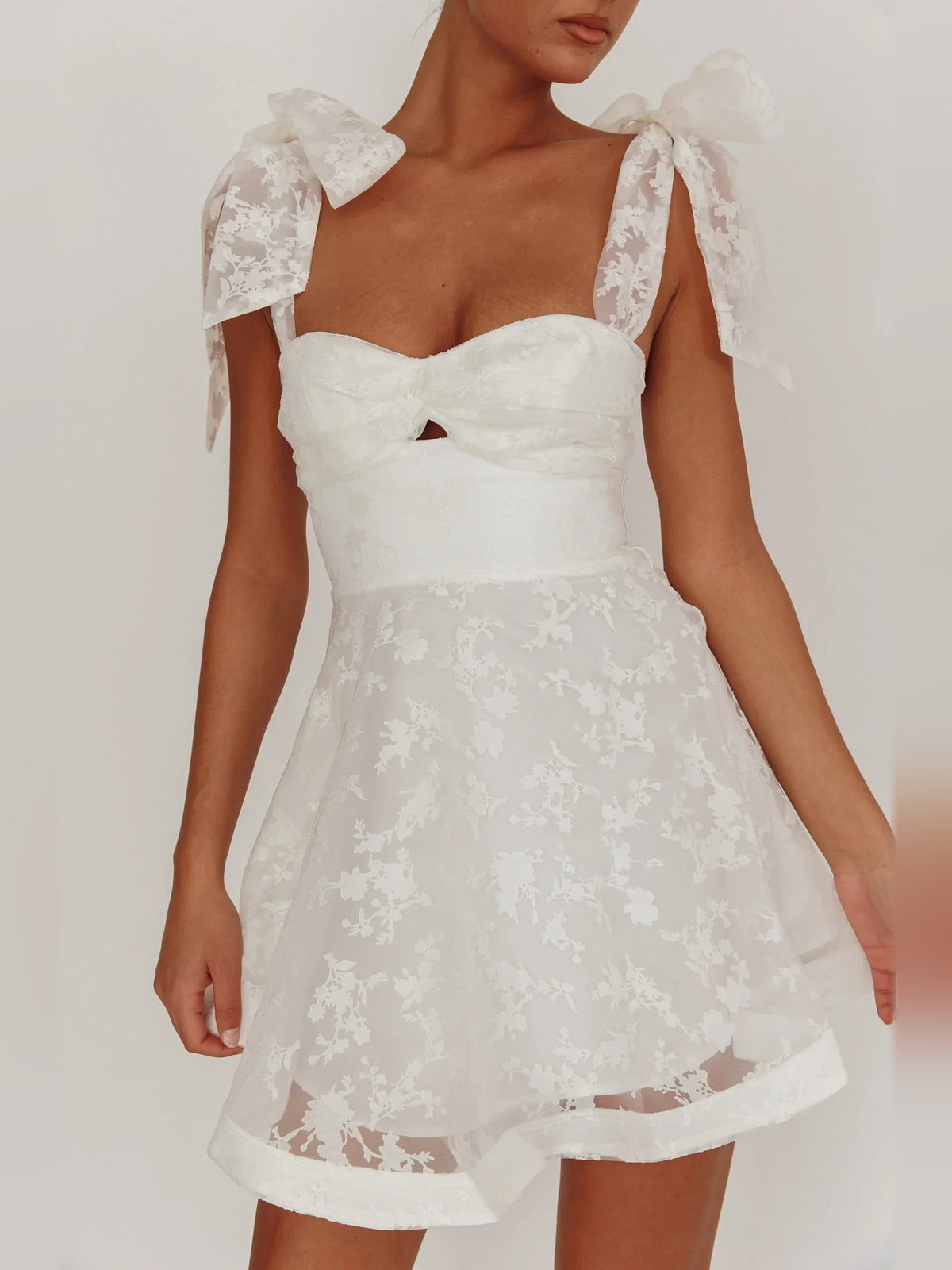 Ivory mini homecoming dress, alternate view showing the dress shape and hem