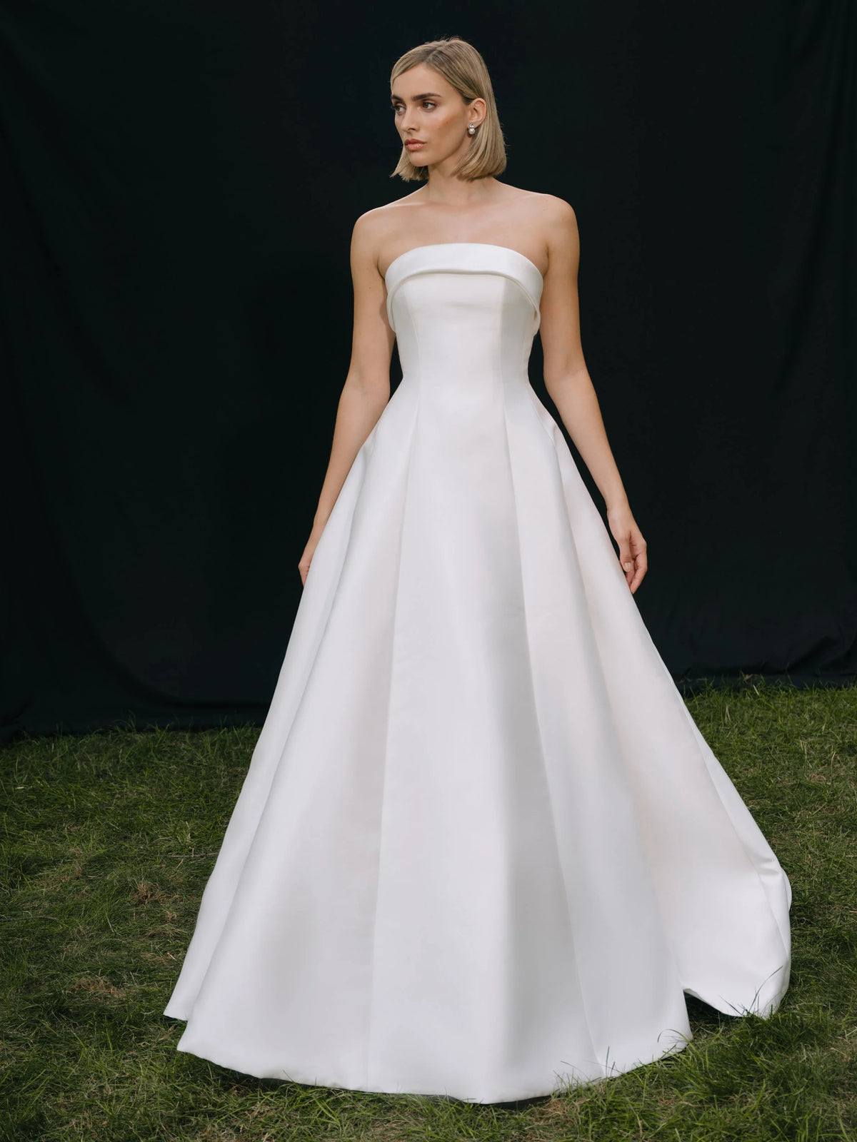 Ivory floor-length wedding dress, alternate view showing the dress shape and hem