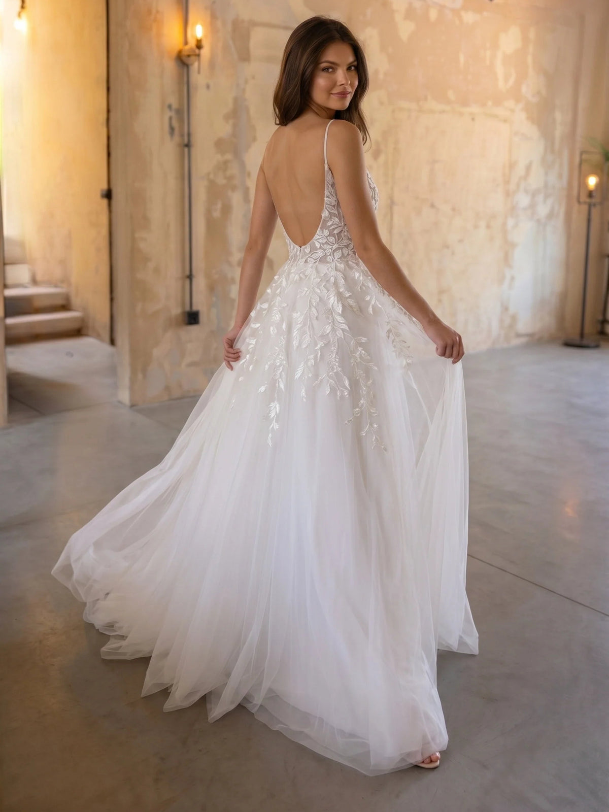 Ivory floor-length wedding dress, alternate view showing the dress shape and hem