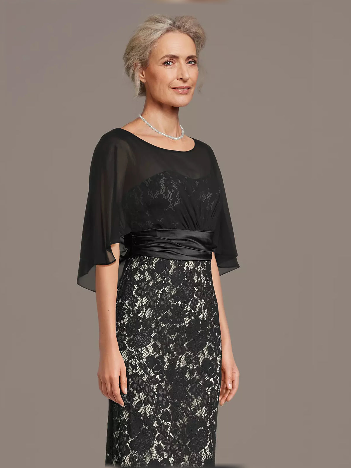 Black maxi mother of the bride dress, alternate view showing the dress shape and hem