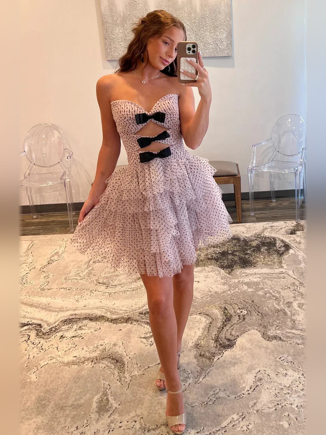 Pink mini homecoming dress, alternate view showing the dress shape and hem
