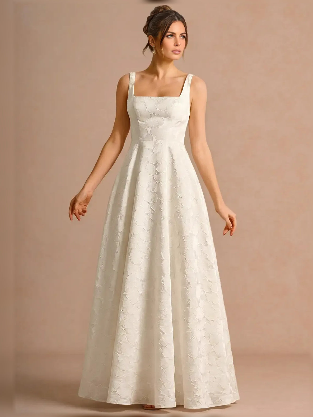 Ivory maxi mother of the bride dress, alternate view showing the dress shape and hem