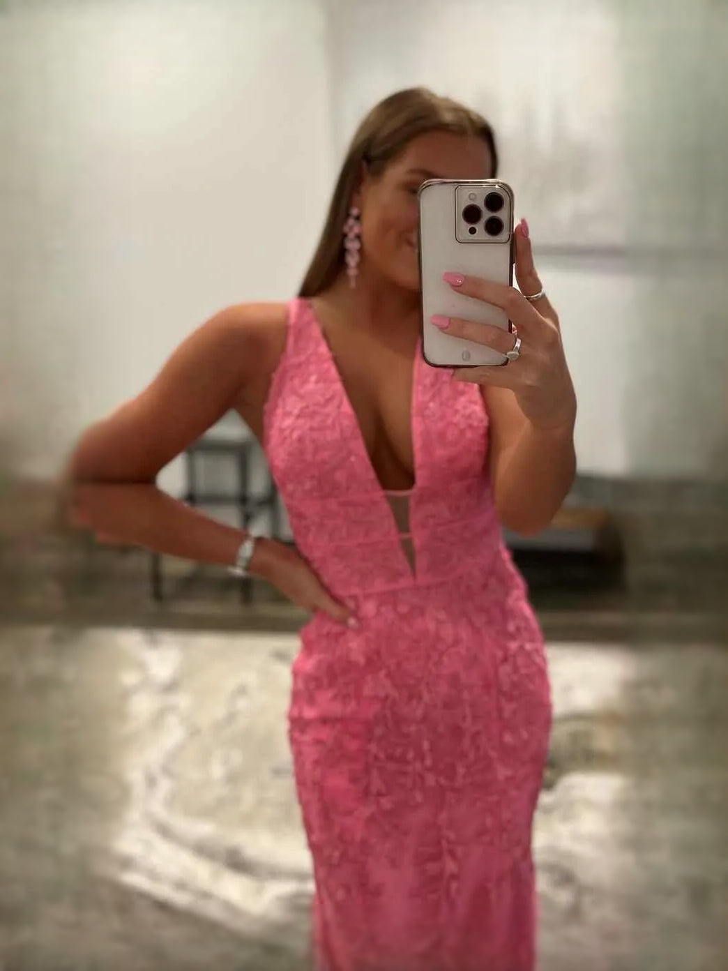 Hot Pink maxi prom dress, back view showing the rear of the dress from another angle
