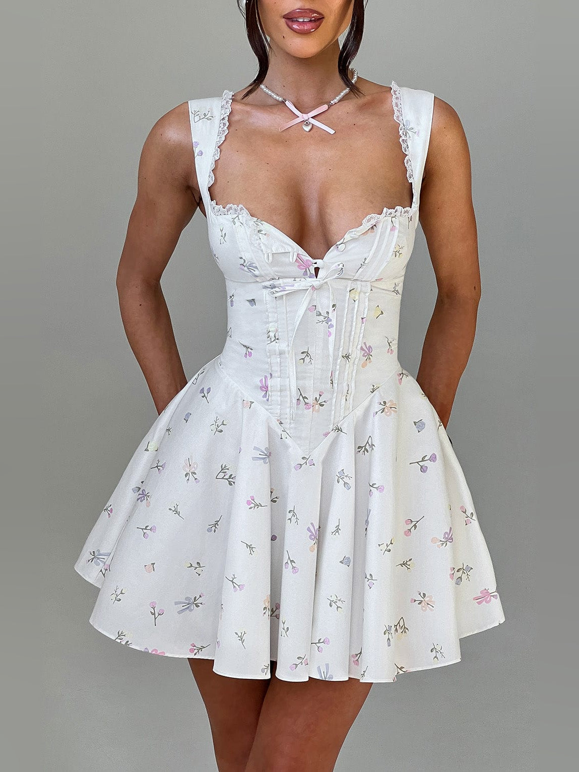 Floral mini homecoming dress, alternate view showing the dress shape and hem